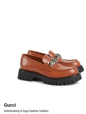 Gucci Men’s Orange Leather Chain Loafers